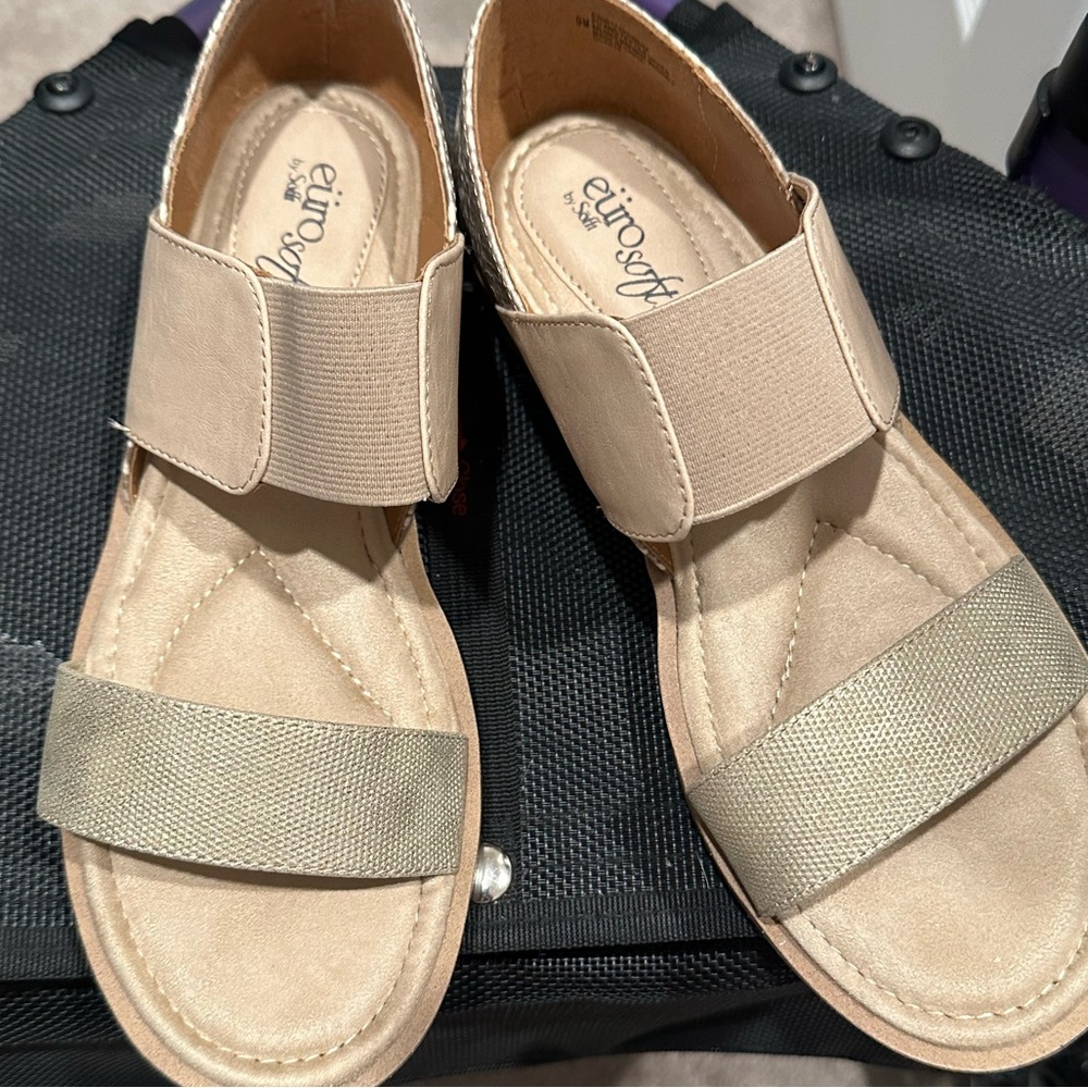 Tan sandals with snake print heels